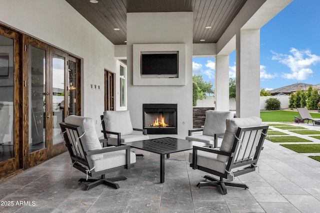 12228 E Wood Dr, Chandler, AZ 85249 - view of patio with french doors, an outdoor living space with a fireplace, and fence