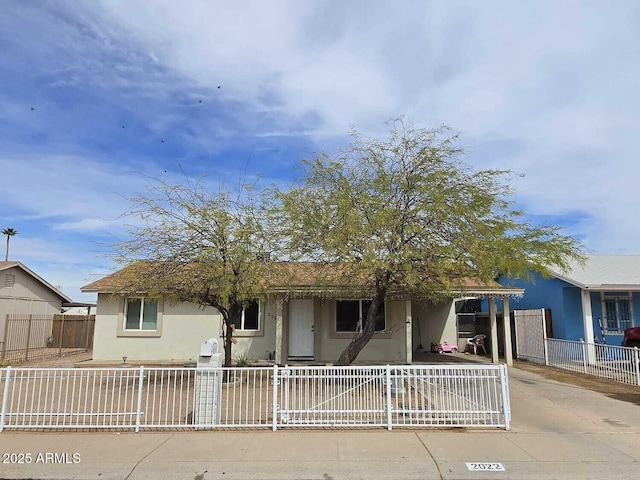 2022 W Atlanta Ave, Phoenix, AZ 85041 - view of front facade with stucco siding and fence