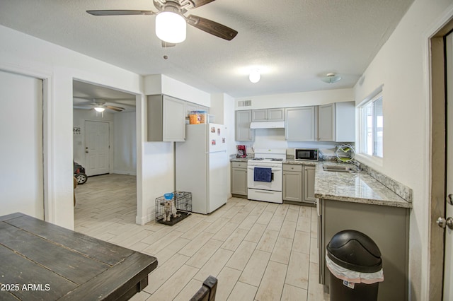 2022 W Atlanta Ave, Phoenix, AZ 85041 - kitchen featuring white appliances, wood tiled floor, ceiling fan, and gray cabinets