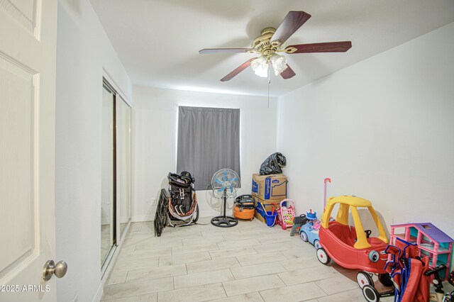 2022 W Atlanta Ave, Phoenix, AZ 85041 - game room with wood finished floors and a ceiling fan