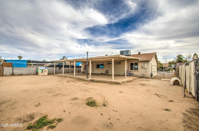 2022 W Atlanta Ave, Phoenix, AZ 85041 - rear view of house with a patio area, fence, central AC, and stucco siding