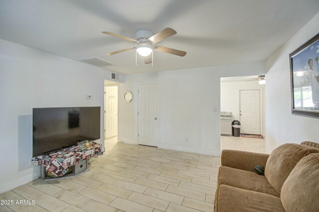2022 W Atlanta Ave, Phoenix, AZ 85041 - living room with visible vents, baseboards, and a ceiling fan
