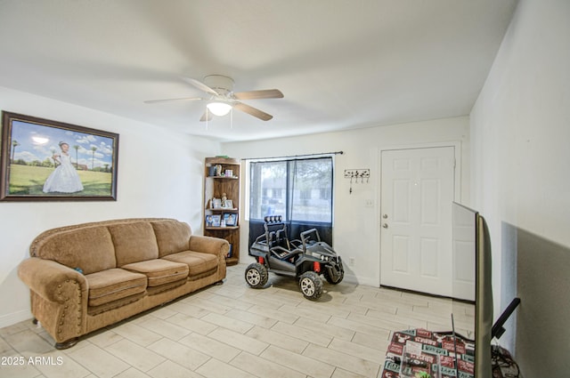 2022 W Atlanta Ave, Phoenix, AZ 85041 - living area featuring baseboards and ceiling fan