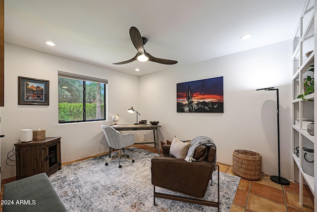 office area featuring tile patterned floors and ceiling fan