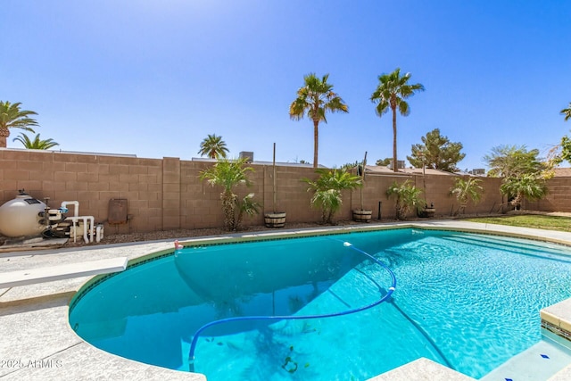 view of swimming pool with a fenced in pool and a fenced backyard