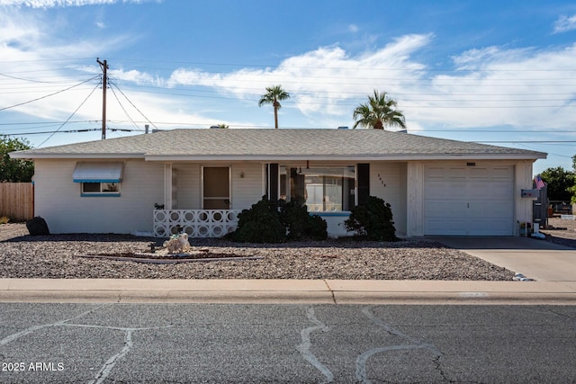 single story home featuring a garage