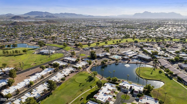 aerial view featuring a water and mountain view