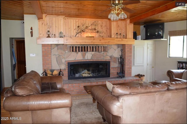 living room featuring beamed ceiling and wood ceiling