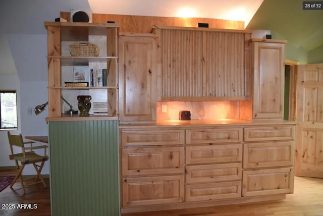 interior space with light brown cabinetry and light hardwood / wood-style flooring