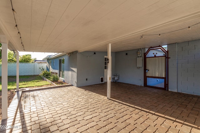 view of patio with electric panel