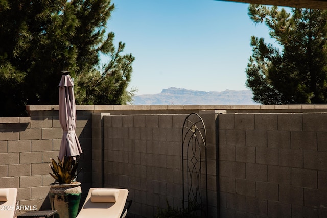 1364 W Spine Tree Ave, Queen Creek, AZ 85140 - view of patio / terrace with a mountain view