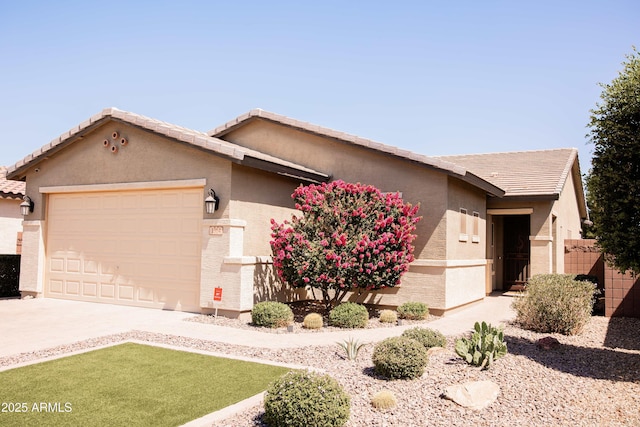 1364 W Spine Tree Ave, Queen Creek, AZ 85140 - view of front of property featuring a garage, driveway, stucco siding, and a tile roof