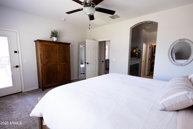 1364 W Spine Tree Ave, Queen Creek, AZ 85140 - bedroom featuring arched walkways, carpet floors, a ceiling fan, and baseboards