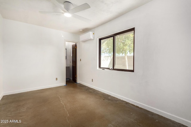 unfurnished room with ceiling fan and a wall mounted air conditioner