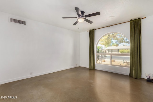 unfurnished room with ceiling fan