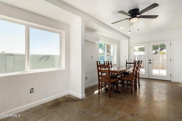 dining area with a wall unit AC, french doors, and ceiling fan