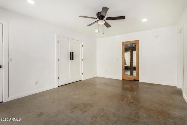 empty room featuring ceiling fan