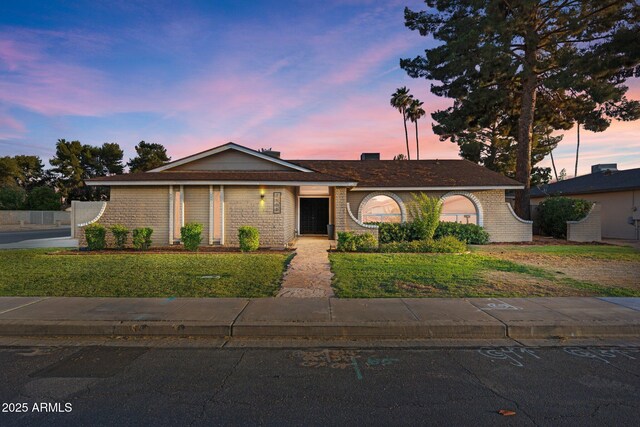 1509 W Kiowa Ave, Mesa, AZ 85202 - ranch-style house featuring a lawn