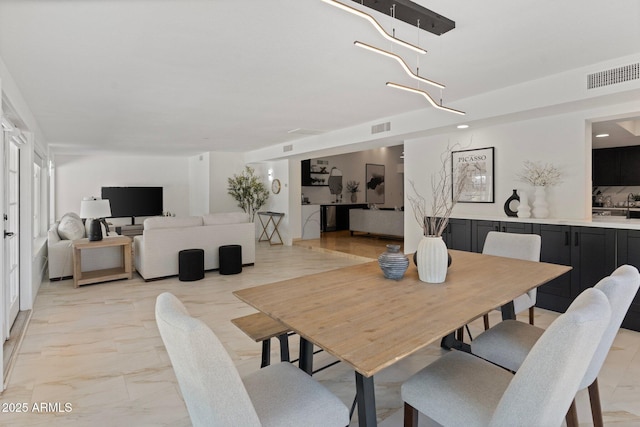 1509 W Kiowa Ave, Mesa, AZ 85202 - dining space with light marble finish floors