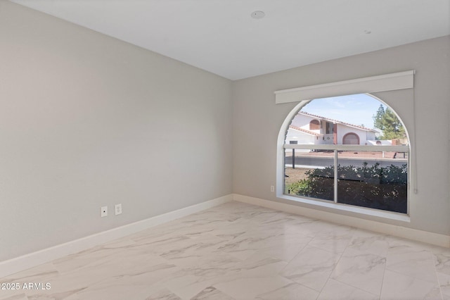1509 W Kiowa Ave, Mesa, AZ 85202 - empty room featuring marble finish flooring and baseboards