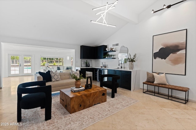 1509 W Kiowa Ave, Mesa, AZ 85202 - living room featuring high vaulted ceiling, beam ceiling, light tile patterned flooring, a chandelier, and beverage cooler
