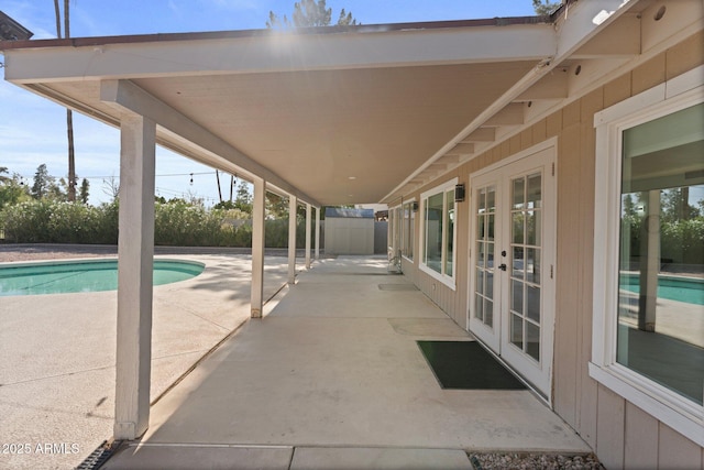 1509 W Kiowa Ave, Mesa, AZ 85202 - view of patio featuring french doors and an outdoor pool