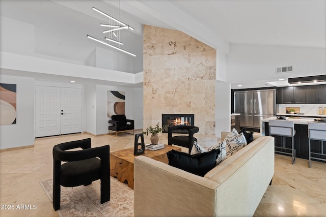 1509 W Kiowa Ave, Mesa, AZ 85202 - living area featuring high vaulted ceiling and a tiled fireplace