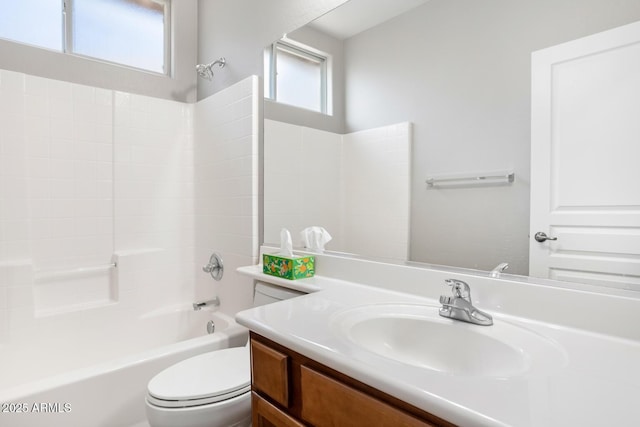 full bathroom featuring vanity, shower / tub combination, and toilet