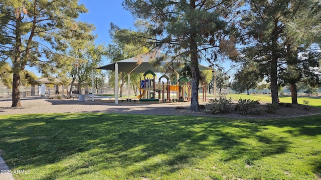 view of community featuring a yard and a playground