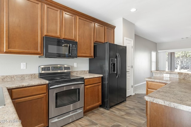 kitchen featuring black appliances