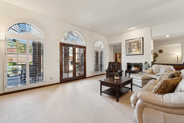 6208 E Paradise Ln, Scottsdale, AZ 85254 - living room with a glass covered fireplace, recessed lighting, carpet flooring, and baseboards