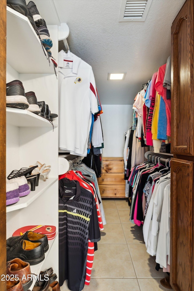 6208 E Paradise Ln, Scottsdale, AZ 85254 - walk in closet with light tile patterned floors and visible vents