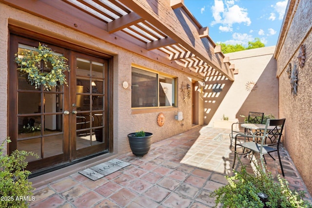 6208 E Paradise Ln, Scottsdale, AZ 85254 - view of patio featuring french doors and a pergola