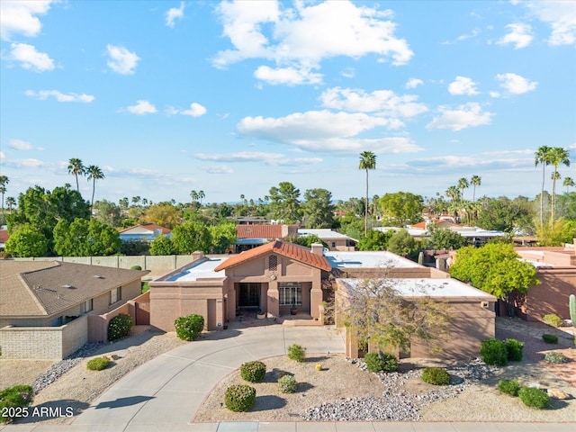 6208 E Paradise Ln, Scottsdale, AZ 85254 - view of front facade with curved driveway and stucco siding