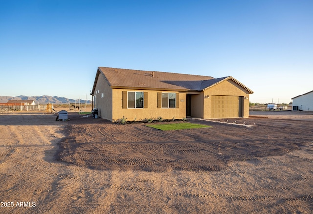 28435 N 249th Ln, Wittmann, AZ 85361 - ranch-style house featuring stucco siding and a garage