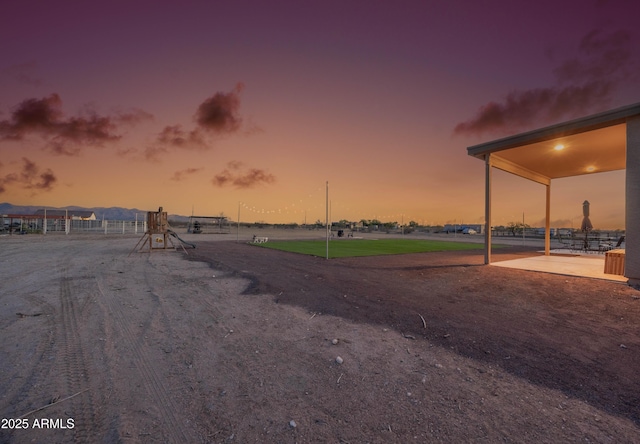 28435 N 249th Ln, Wittmann, AZ 85361 - view of yard at dusk