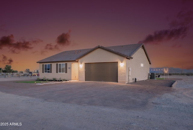 28435 N 249th Ln, Wittmann, AZ 85361 - single story home with a garage, a tile roof, stucco siding, and central AC unit