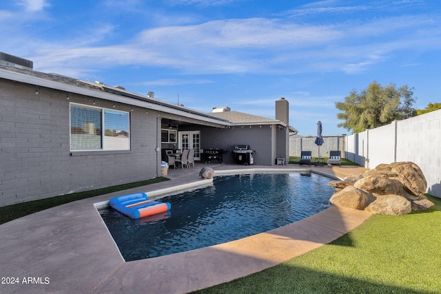 view of pool with a patio