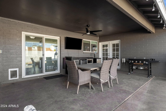 view of patio featuring grilling area, ceiling fan, and french doors