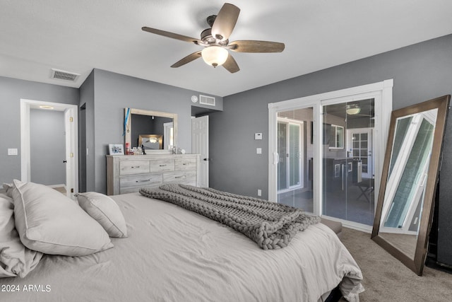 carpeted bedroom with ceiling fan and access to outside