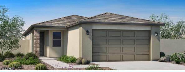 view of front of property featuring a garage and an outbuilding