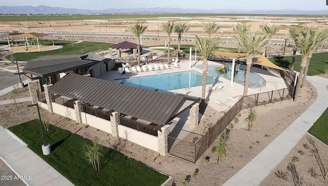 3885 E Kenley Ln, San Tan Valley, AZ 85143 - community pool featuring a patio and a mountain view