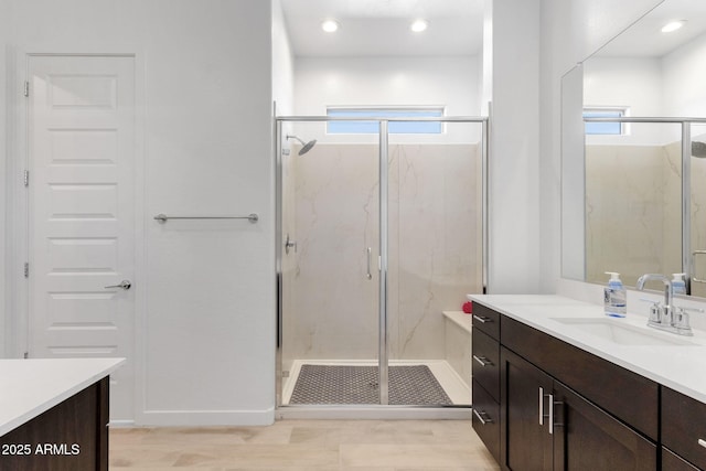3885 E Kenley Ln, San Tan Valley, AZ 85143 - full bathroom featuring a marble finish shower, vanity, healthy amount of natural light, and recessed lighting