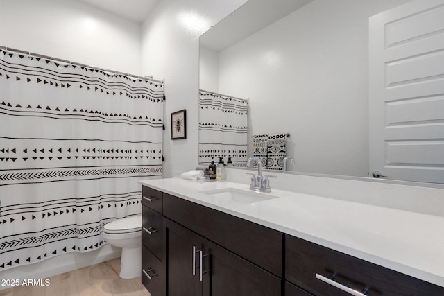 3885 E Kenley Ln, San Tan Valley, AZ 85143 - full bath featuring toilet, vanity, and wood finished floors