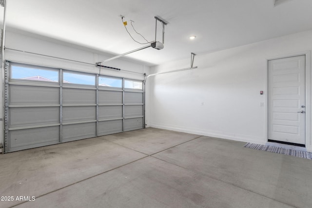 3885 E Kenley Ln, San Tan Valley, AZ 85143 - garage with a garage door opener, baseboards, and recessed lighting