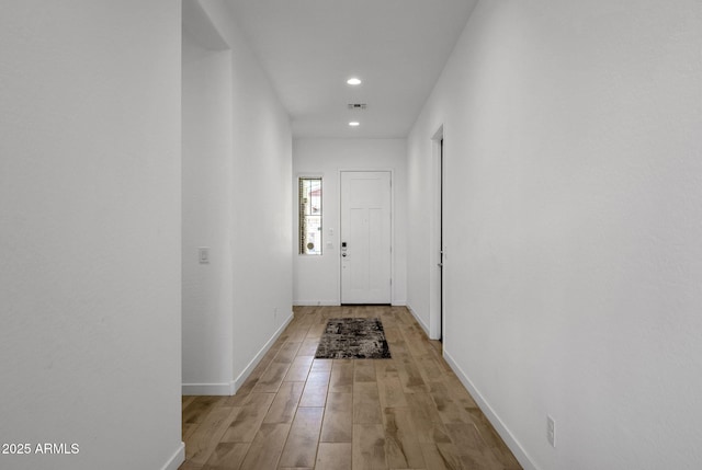 3885 E Kenley Ln, San Tan Valley, AZ 85143 - doorway featuring recessed lighting, light wood finished floors, and baseboards