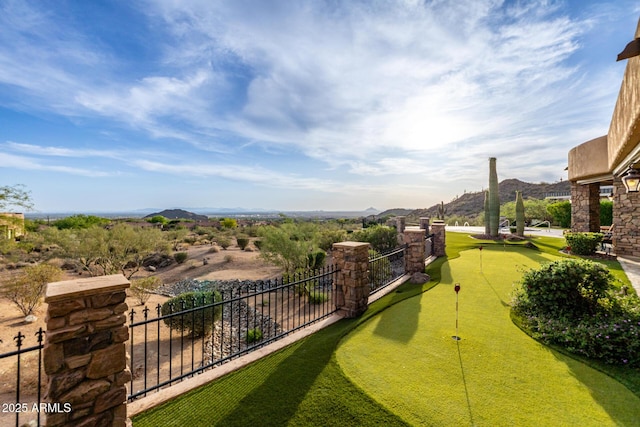 4328 N Pinnacle Ridge Cir, Mesa, AZ 85207 - view of yard with a putting green and a mountain view