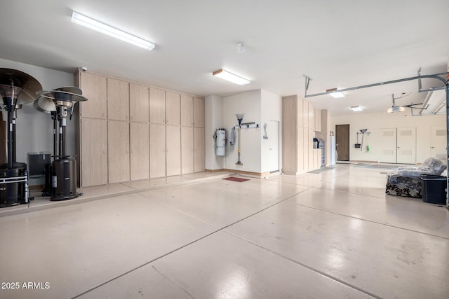 4328 N Pinnacle Ridge Cir, Mesa, AZ 85207 - garage with a garage door opener and a central vacuum unit