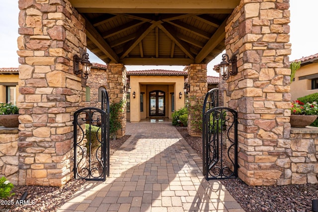 4328 N Pinnacle Ridge Cir, Mesa, AZ 85207 - doorway to property with a gate, french doors, a tile roof, and stucco siding