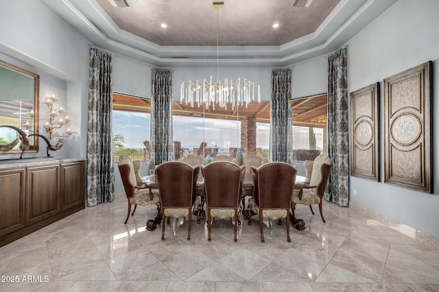 4328 N Pinnacle Ridge Cir, Mesa, AZ 85207 - dining area with a tray ceiling, a chandelier, plenty of natural light, and light marble finish floors